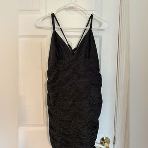 Black glittery dress.